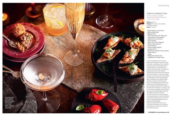 Creative food photography showing a shot showing a table top filled with porcini croquettes and different drinks to compliment
