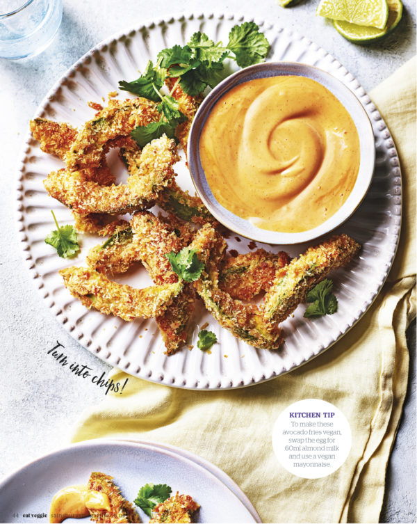 Creative food photography showing breaded vegetables and a side dip